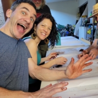 Gal and Liron Szekely enjoying a fun group activity during a couples relationship retreat